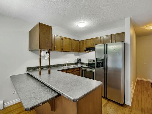 11 10931 83 Street, Edmonton, AB - Indoor Photo Showing Kitchen With Double Sink