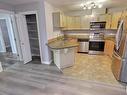 229 300 Spruce Ridge Road, Spruce Grove, AB  - Indoor Photo Showing Kitchen With Double Sink 