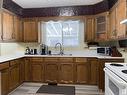 5428 49 Street, Warburg, AB  - Indoor Photo Showing Kitchen With Double Sink 