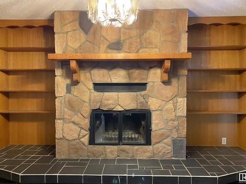 5428 49 Street, Warburg, AB - Indoor With Fireplace