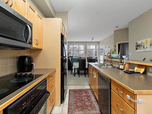 407 8619 111 Street, Edmonton, AB - Indoor Photo Showing Kitchen With Double Sink