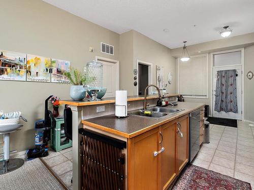 407 8619 111 Street, Edmonton, AB - Indoor Photo Showing Kitchen With Double Sink