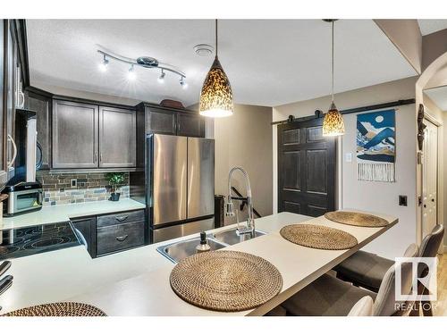 34 2565 Hanna Crescent, Edmonton, AB - Indoor Photo Showing Kitchen With Double Sink