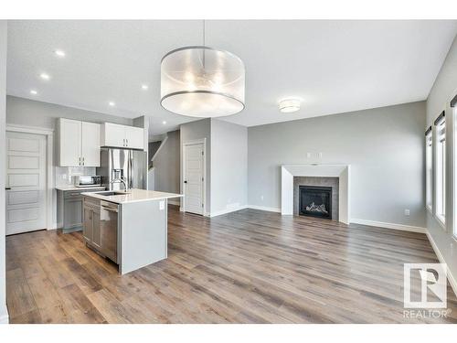 4787 Kinney Road, Edmonton, AB - Indoor With Fireplace