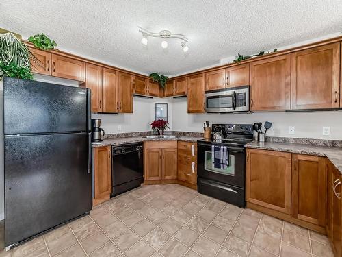 5116 7335 South Terwillegar Drive, Edmonton, AB - Indoor Photo Showing Kitchen With Double Sink