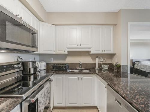 1003 10649 Saskatchewan Drive, Edmonton, AB - Indoor Photo Showing Kitchen With Double Sink