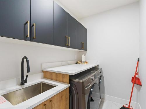 3810 42 Avenue, Beaumont, AB - Indoor Photo Showing Laundry Room