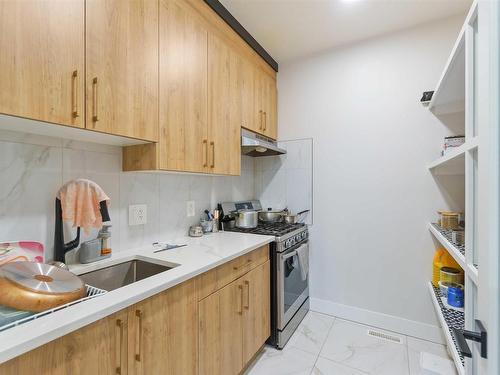 3810 42 Avenue, Beaumont, AB - Indoor Photo Showing Kitchen