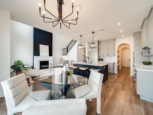 18 Newbury Circle, Sherwood Park, AB - Indoor Photo Showing Dining Room With Fireplace