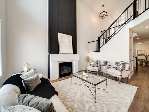 18 Newbury Circle, Sherwood Park, AB - Indoor Photo Showing Living Room With Fireplace