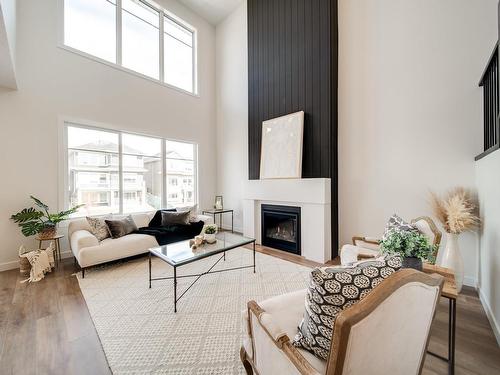 18 Newbury Circle, Sherwood Park, AB - Indoor Photo Showing Living Room With Fireplace