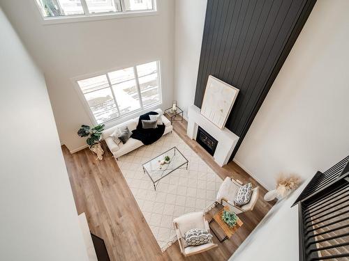 18 Newbury Circle, Sherwood Park, AB - Indoor Photo Showing Other Room With Fireplace