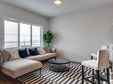 99 Brickyard Drive, Stony Plain, AB  - Indoor Photo Showing Living Room 