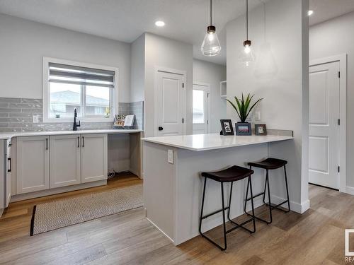 97 Brickyard Drive, Stony Plain, AB - Indoor Photo Showing Kitchen With Upgraded Kitchen