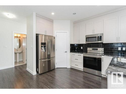 9162 Cooper Crescent, Edmonton, AB - Indoor Photo Showing Kitchen