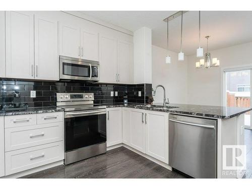 9162 Cooper Crescent, Edmonton, AB - Indoor Photo Showing Kitchen With Upgraded Kitchen