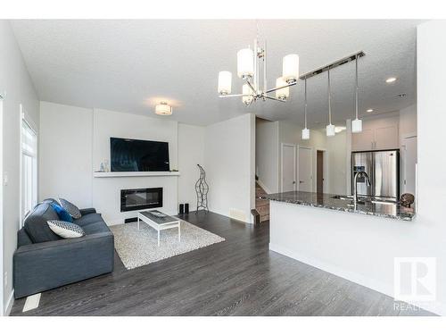 9162 Cooper Crescent, Edmonton, AB - Indoor With Fireplace