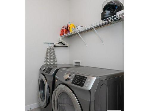 9162 Cooper Crescent, Edmonton, AB - Indoor Photo Showing Laundry Room