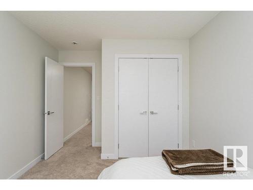 9162 Cooper Crescent, Edmonton, AB - Indoor Photo Showing Bedroom