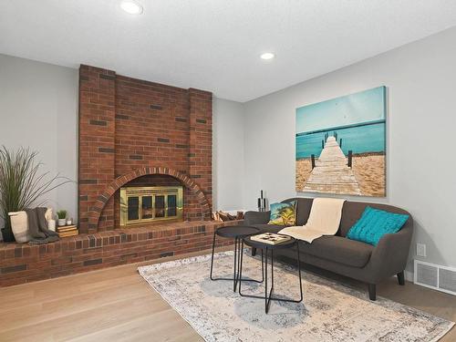 6247 187 Street, Edmonton, AB - Indoor Photo Showing Living Room With Fireplace