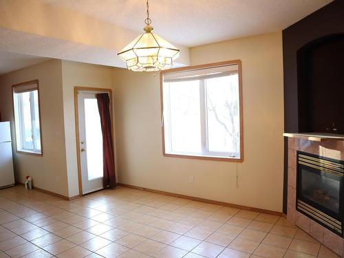 16002 67A Street Nw, Edmonton, AB - Indoor Photo Showing Other Room With Fireplace