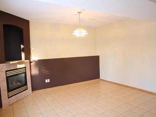 16002 67A Street Nw, Edmonton, AB - Indoor Photo Showing Other Room With Fireplace