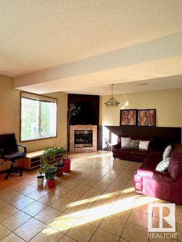 16002 67A Street, Edmonton, AB - Indoor Photo Showing Living Room With Fireplace