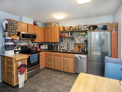 7917 178 Street, Edmonton, AB - Indoor Photo Showing Kitchen With Stainless Steel Kitchen With Double Sink