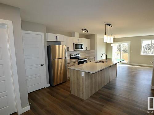 Upper 9357 Pear Link Link, Edmonton, AB - Indoor Photo Showing Kitchen With Double Sink With Upgraded Kitchen