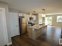 Upper 9357 Pear Link Link, Edmonton, AB  - Indoor Photo Showing Kitchen With Double Sink With Upgraded Kitchen 