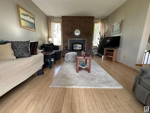 4417 Lakeshore Drive, Bonnyville Town, AB - Indoor Photo Showing Living Room With Fireplace