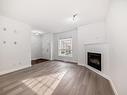 32 13825 155 Avenue, Edmonton, AB  - Indoor Photo Showing Living Room With Fireplace 