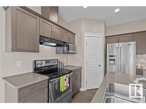 71 Elm Street, Fort Saskatchewan, AB - Indoor Photo Showing Kitchen With Double Sink With Upgraded Kitchen