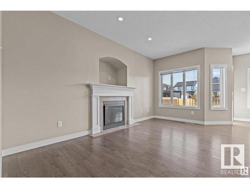 71 Elm Street, Fort Saskatchewan, AB - Indoor Photo Showing Living Room With Fireplace