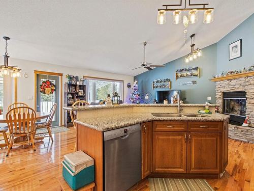 1 53526 Rge Road 273, Rural Parkland County, AB - Indoor Photo Showing Kitchen With Fireplace With Double Sink