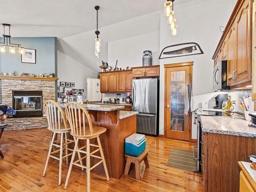 1 53526 Rge Road 273, Rural Parkland County, AB - Indoor Photo Showing Kitchen With Fireplace