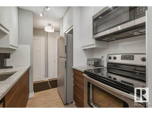 401 13910 Stony Plain Road, Edmonton, AB - Indoor Photo Showing Kitchen With Upgraded Kitchen