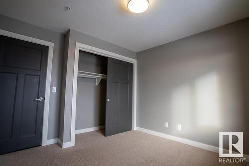 207 16235 51 Street Nw, Edmonton, AB - Indoor Photo Showing Other Room