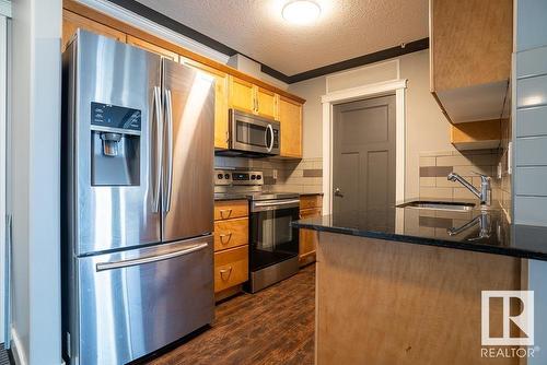 207 16235 51 Street Nw, Edmonton, AB - Indoor Photo Showing Kitchen