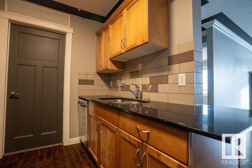 207 16235 51 Street Nw, Edmonton, AB - Indoor Photo Showing Kitchen With Double Sink