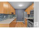 3139 139 Avenue, Edmonton, AB  - Indoor Photo Showing Kitchen With Stainless Steel Kitchen With Double Sink 