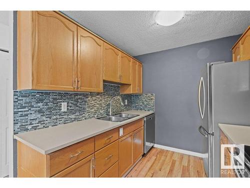 3139 139 Avenue, Edmonton, AB - Indoor Photo Showing Kitchen With Double Sink