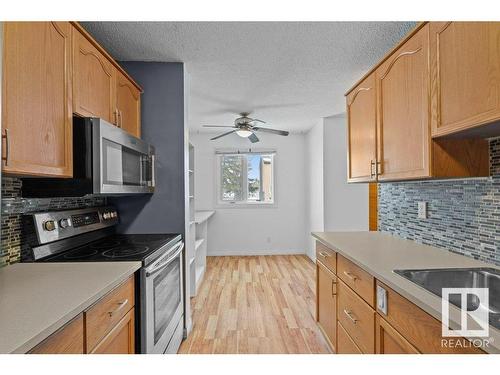 3139 139 Avenue, Edmonton, AB - Indoor Photo Showing Kitchen With Stainless Steel Kitchen