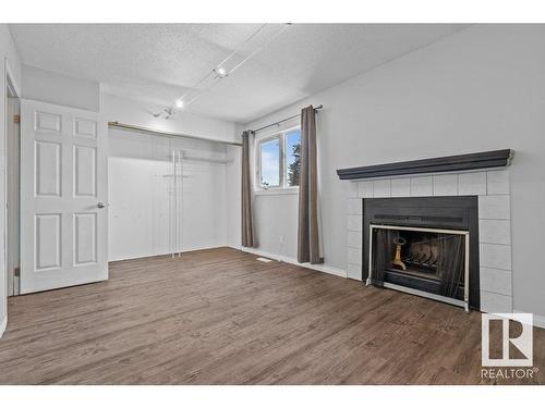 3139 139 Avenue, Edmonton, AB - Indoor Photo Showing Living Room With Fireplace