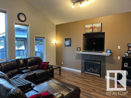 44 Birchmont Drive, Leduc, AB - Indoor Photo Showing Living Room With Fireplace