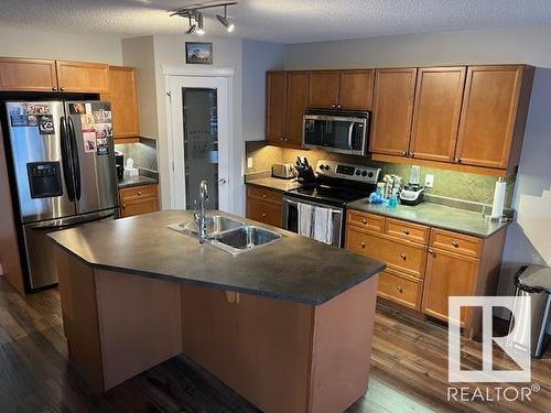 44 Birchmont Drive, Leduc, AB - Indoor Photo Showing Kitchen With Double Sink