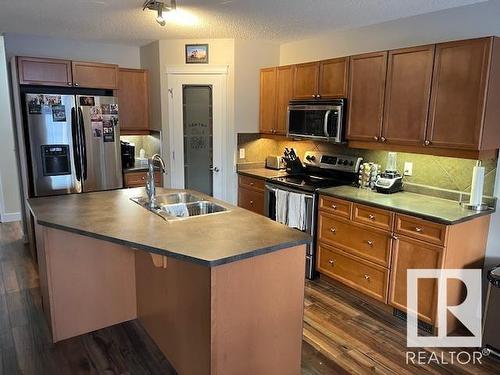 44 Birchmont Drive, Leduc, AB - Indoor Photo Showing Kitchen With Double Sink