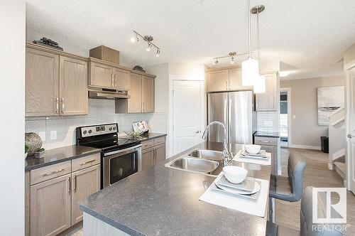 1729 Westerra Wynd, Stony Plain, AB - Indoor Photo Showing Kitchen With Double Sink With Upgraded Kitchen