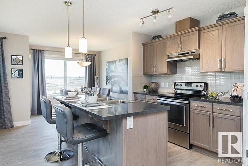 1729 Westerra Wynd, Stony Plain, AB - Indoor Photo Showing Kitchen With Double Sink With Upgraded Kitchen