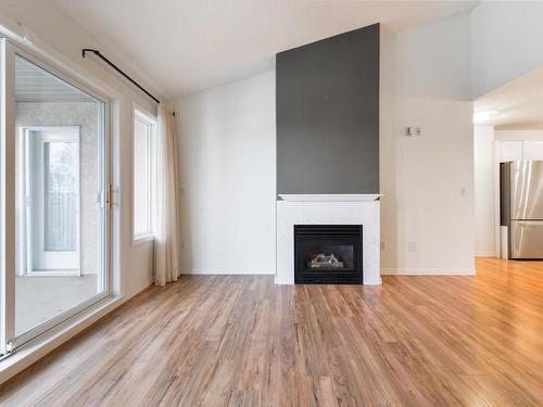 417 8912 156 Street, Edmonton, AB - Indoor Photo Showing Living Room With Fireplace